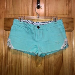 O’Neill teal jean shorts with lace